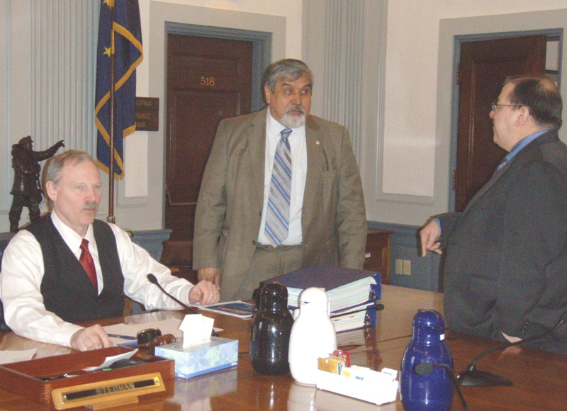 Senator Stedman at work in the Senate Finance Committee with Representative Thomas...