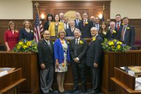 Alaska State Senate first day of 30th Legislature. Senators taking oath of office. Senate family photos and staff.
