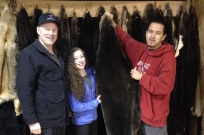 Russell James gives Senator Stedman and his daughter a tour of the Sitka Tribes tannery
